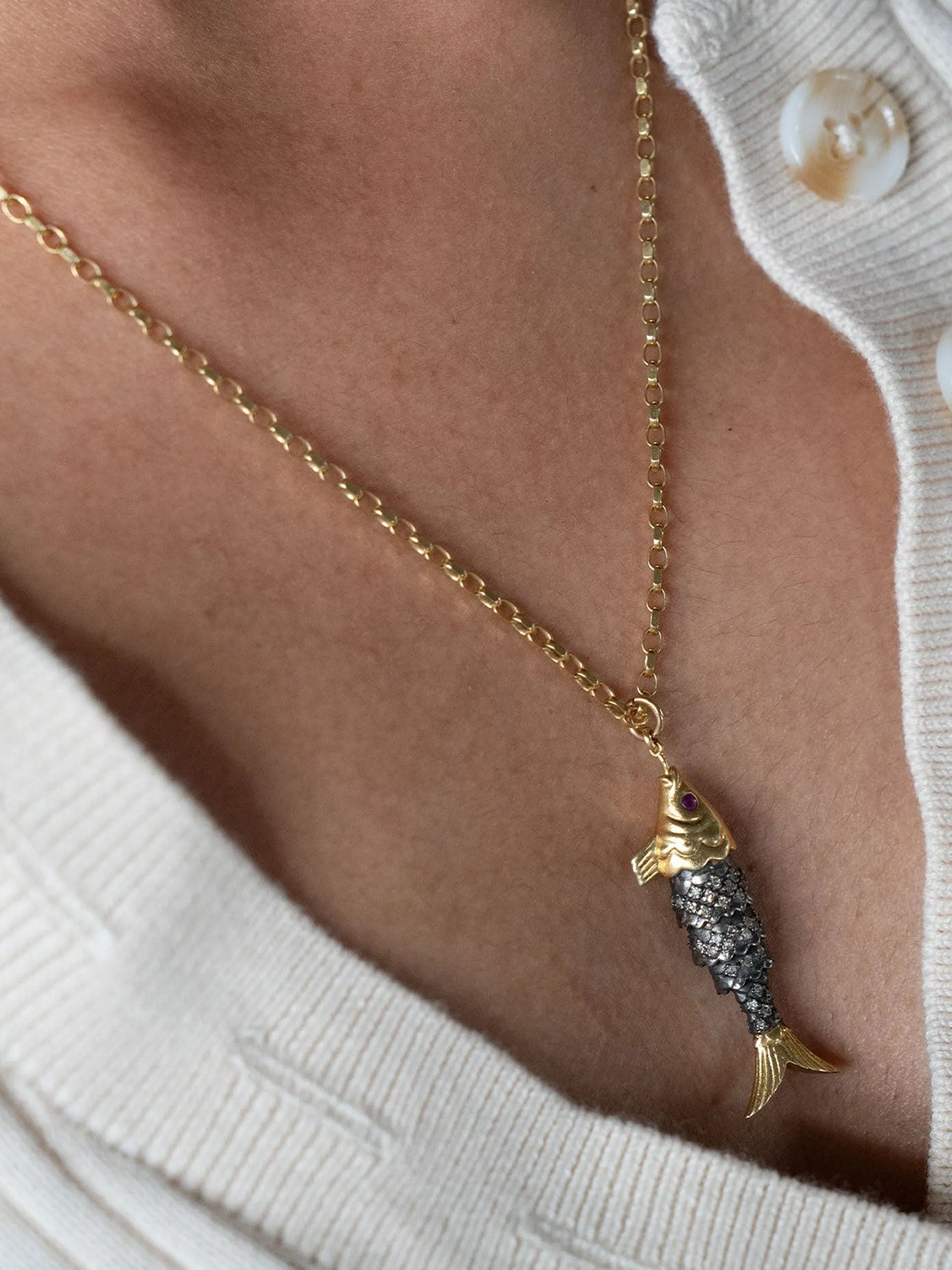 Diamond and ruby fish pendant