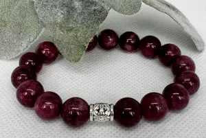 Garnet 10mm stretch beaded bracelet with silver. spacer. Gift for him, gift for her. January Birthday Stone. Passion, Protection, Energy.