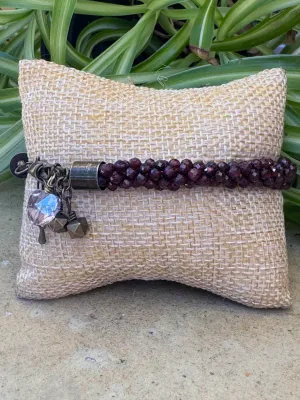 Kumihimo Garnet Gemstone Bracelet - Garnet Gemstone bracelet with flower hanging charm.