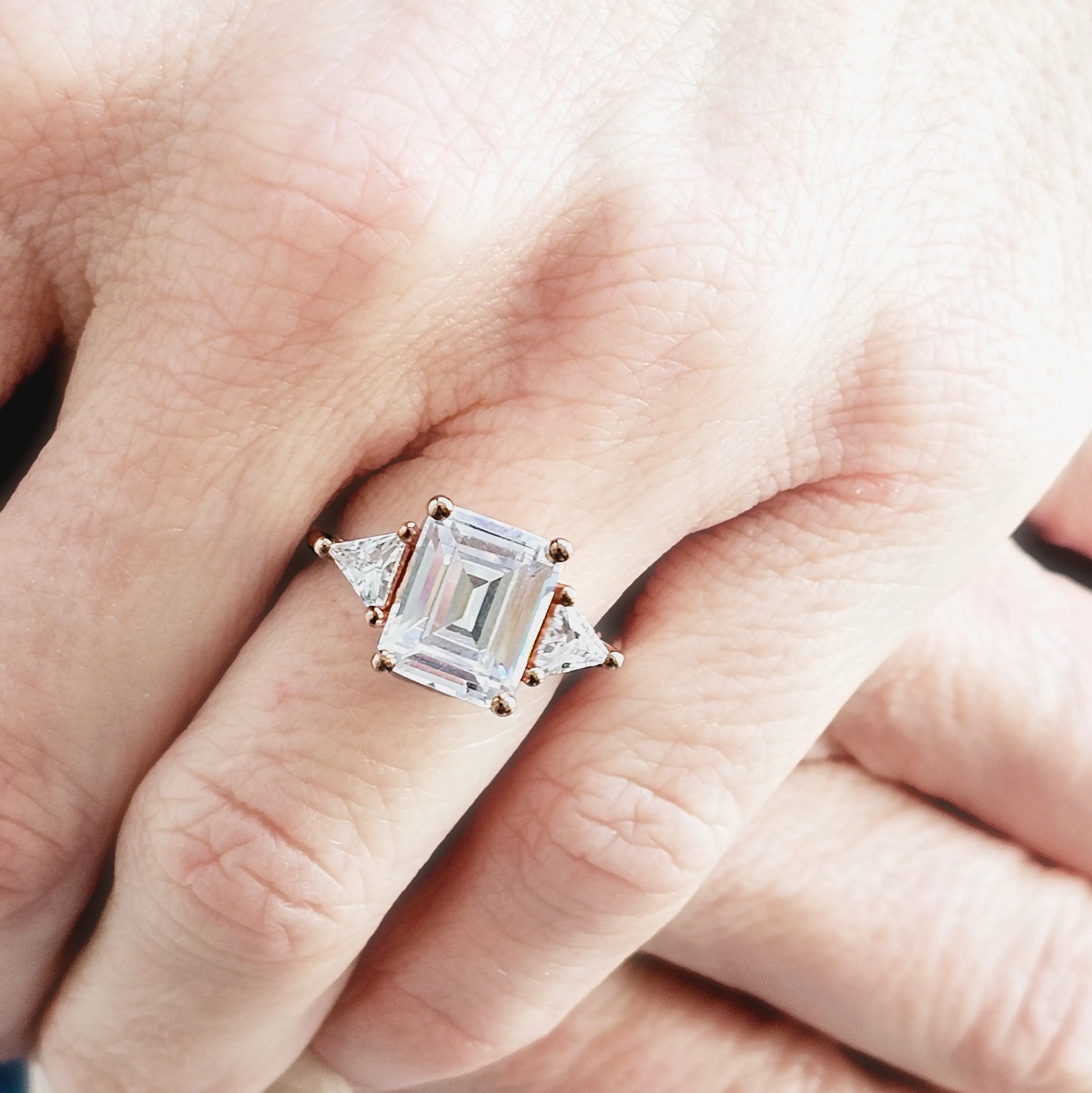 Three Stone Emerald and Trillion Cut Diamond Engagement Ring